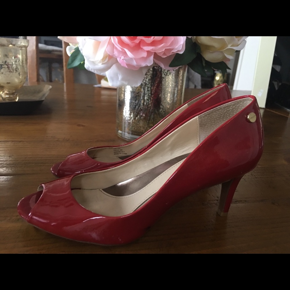 Like new red Calvin Klein peep toe heels